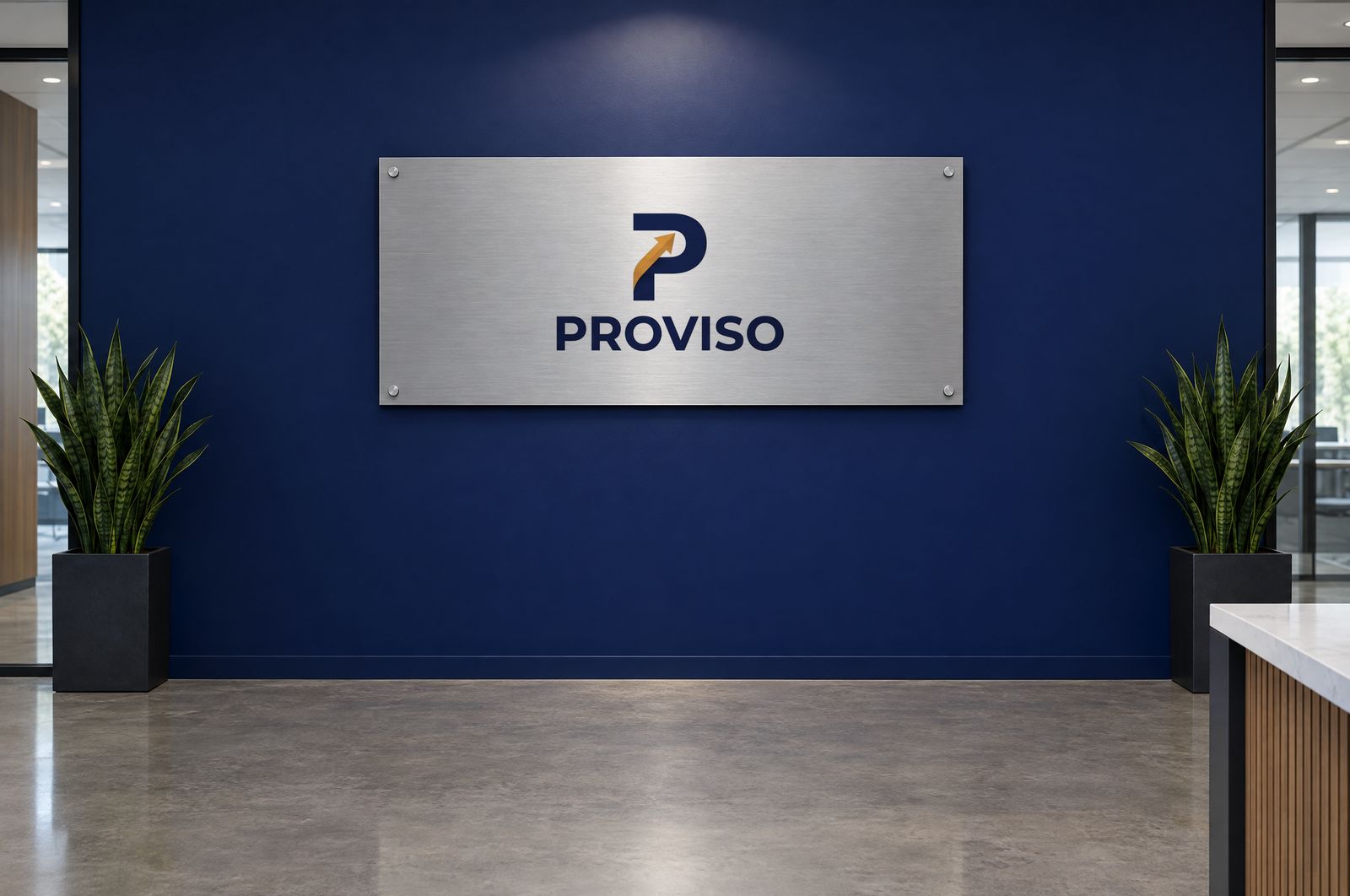 The Proviso logo on a brushed aluminum sign on a navy reception wall.